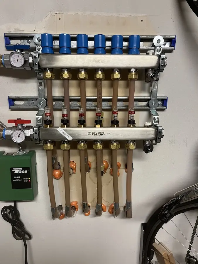 Plumber performing Water Heater Repair at a residential property in Fort Belvoir